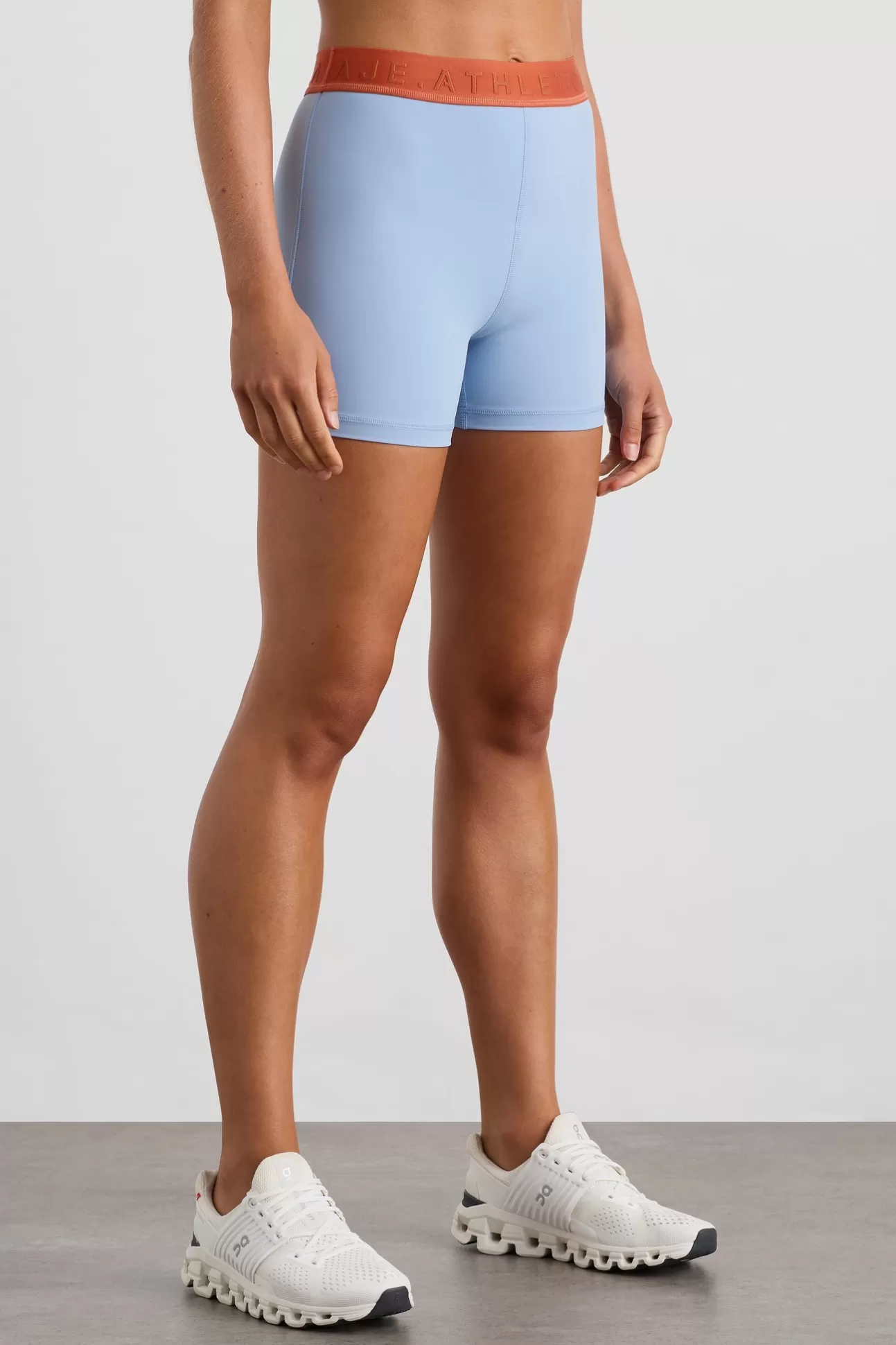 Aje ATHLETICA Bike Short 017 Steel Blue Copper Orange Store