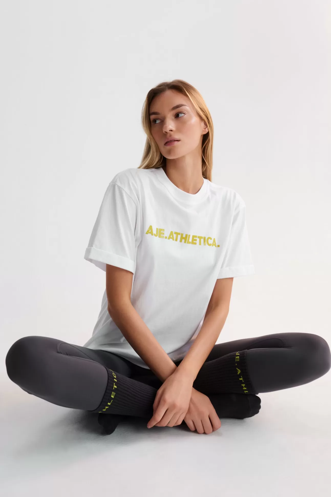 Aje ATHLETICA Bold Logo Tee 105 White/Solarblaze Store