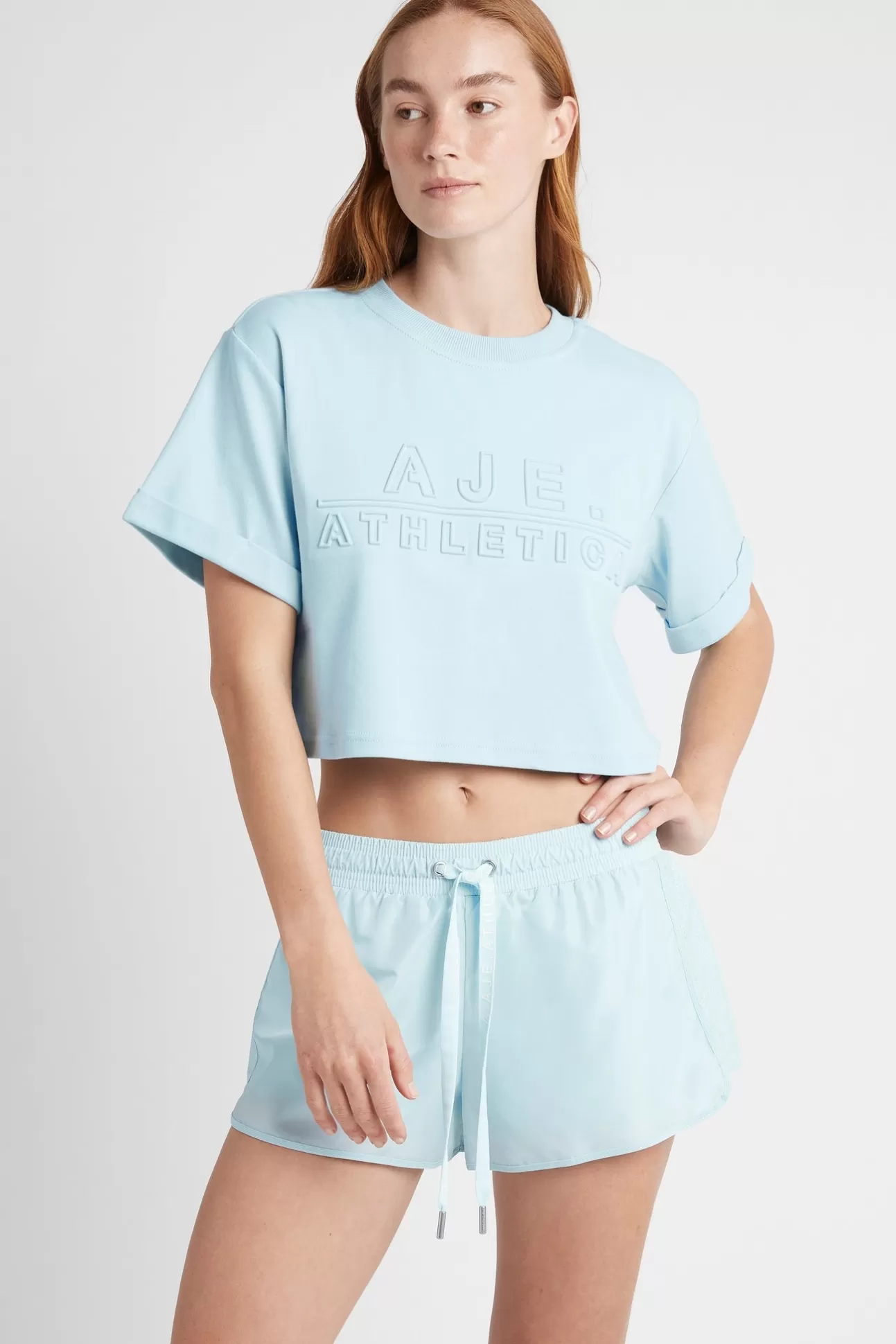 Aje ATHLETICA Cropped Embossed Classic Logo T-Shirt 105 Ice Blue Sale