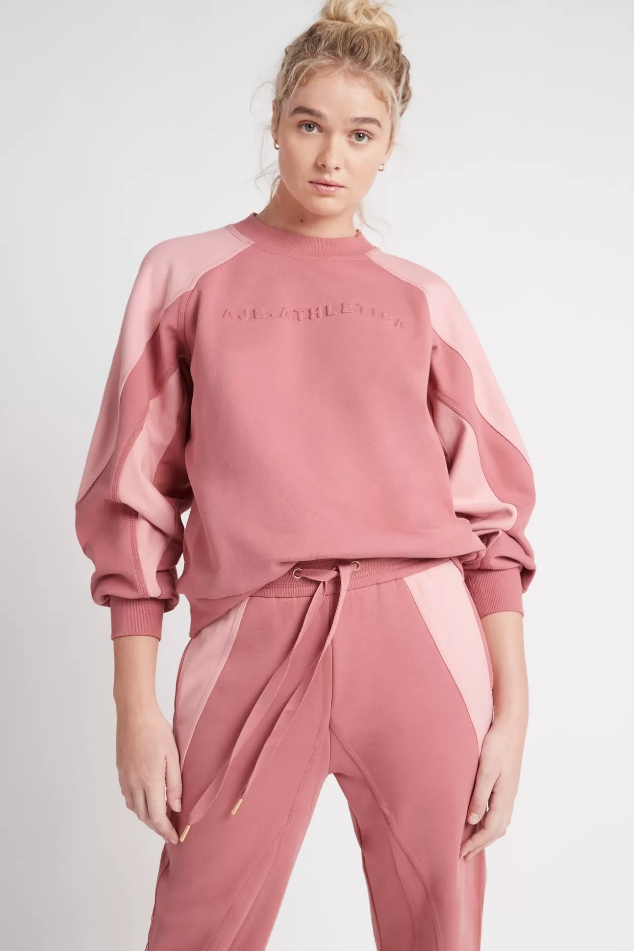 Aje ATHLETICA Embossed Signature Logo Crew Jumper 410 Rose Pink/Rose Quartz Shop