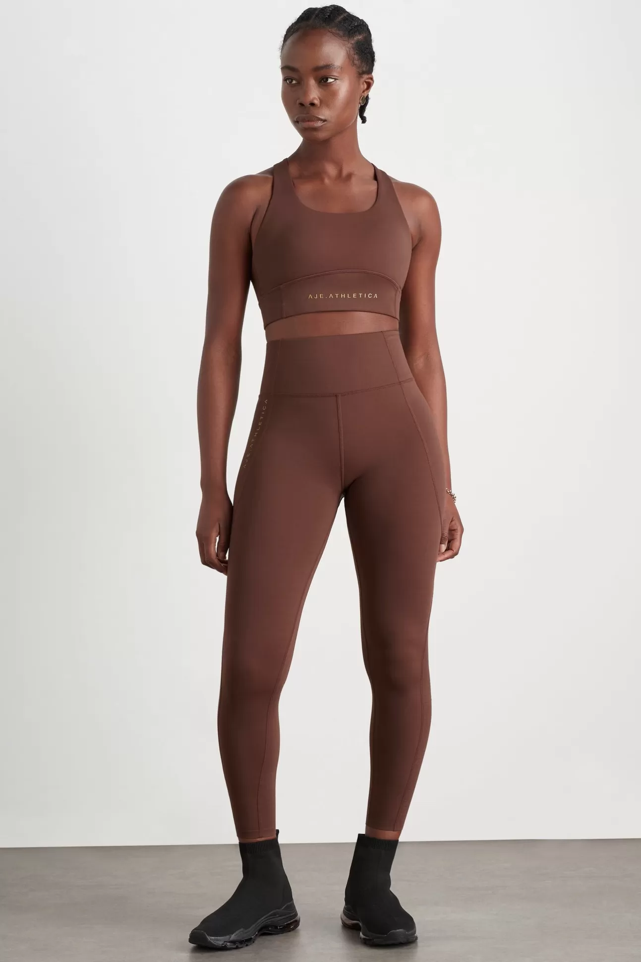 Aje ATHLETICA High Rise Perforated Hem Full Length Legging 227 Dark Chocolate Store