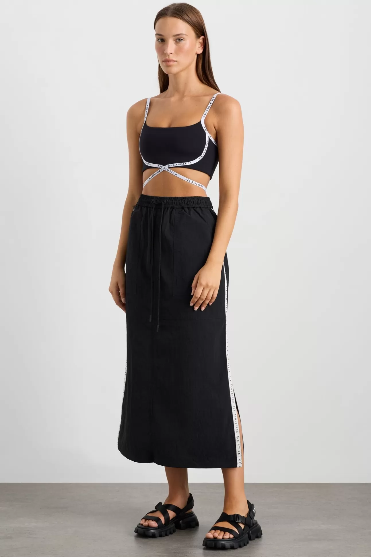 Aje ATHLETICA Logo Tape Spray Midi Skirt 647 Black Fashion