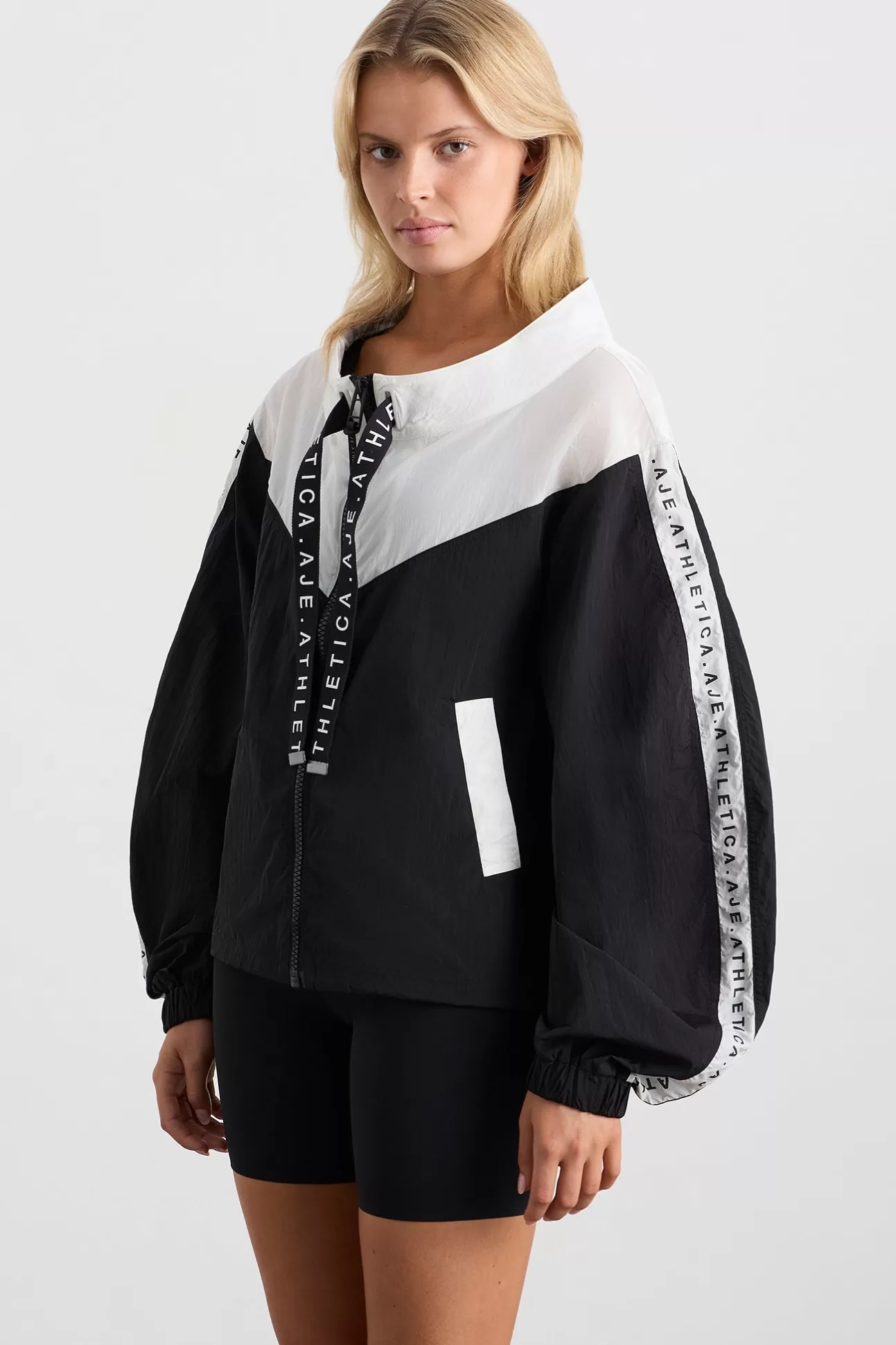 Aje ATHLETICA Logotape Spray Jacket 762 Black/White Store